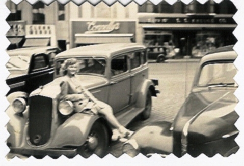 Lyn Posing on Automobile